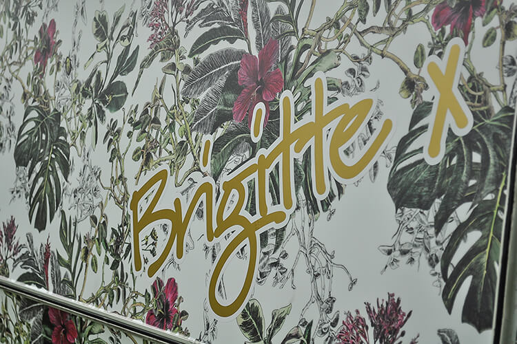 Tropical floral exterior of a vintage caravan